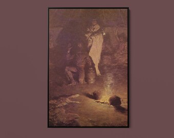May include: A framed art print depicting a dimly lit interior scene with two figures near a small fire. One figure kneels on the ground while the other stands draped in a light-colored garment. The warm glow of the flames illuminates the dark surroundings.
