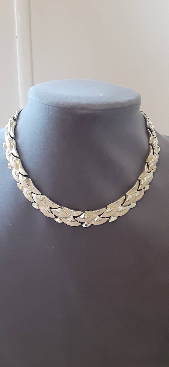 Vintage signed Coro choker with white thermoplastic squares set in goldtone metal.