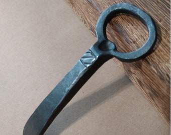 Hand forged bottle opener.  Great gift idea.