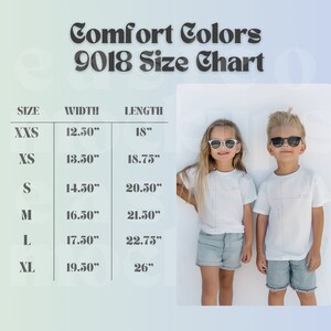 May include: A size chart for Comfort Colors 9018 t-shirts, with measurements in inches. The chart includes sizes XXS to XL, with corresponding widths and lengths. Two children wearing white t-shirts and sunglasses are also in the image.