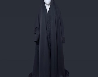 Zwarte chador met ritssluiting: abaya boven het hoofd, abaa, muharram gol chadar, moslimsluier