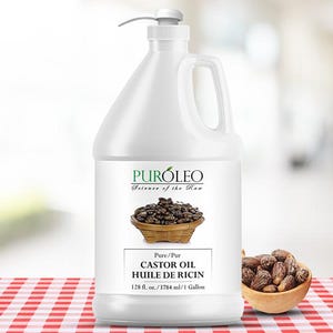 May include: A white plastic jug of castor oil with a pump dispenser. The label reads "PUR&Oacute;LEO Science of the Raw" and "CASTOR OIL HUILE DE RICIN". A small wooden bowl of castor beans sits next to the jug. The jug contains 128 fl. oz. of oil.