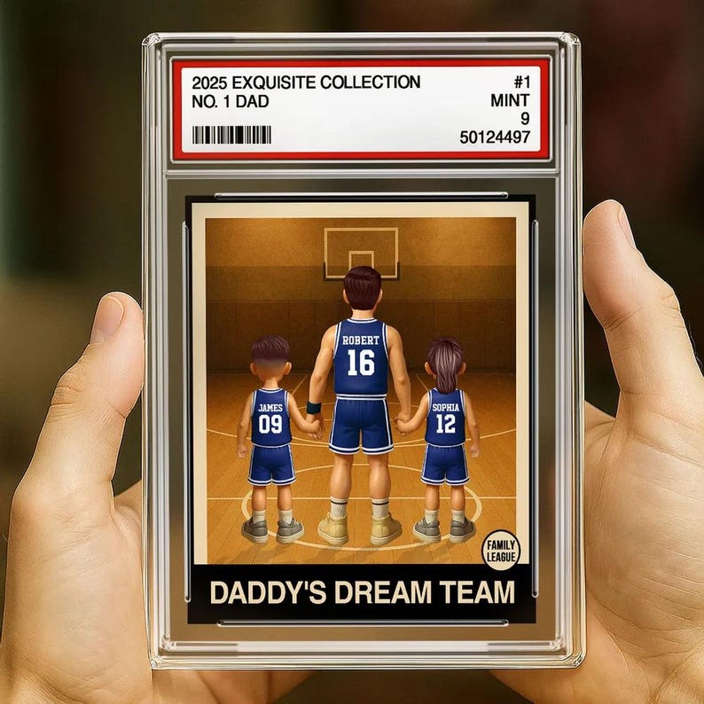 May include: A vintage-style sports card featuring a cartoon illustration of a family basketball team. The card has a blue and white color scheme with the text "Daddy's Dream Team" and "Family League" printed on it.