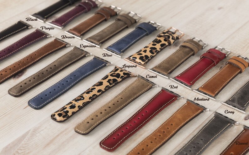 May include: A variety of leather watch bands in different colors and patterns, including black, purple, brown, espresso, blue, leopard, camel, red, mustard, gray, and rust.