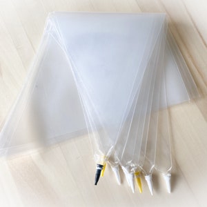 Pochette avec mini douille en plastique de 1 mm pour glaçage royal