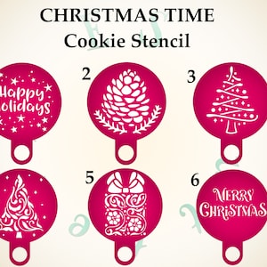 May include: Six pink cookie stencils with white designs. The stencils are numbered 1 through 6. The designs include a pine cone, a Christmas tree, a present, and the words "Happy Holidays" and "Merry Christmas".