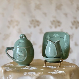Korean Traditional Handmade Crane Egg Shaped Celadon Tea Cup with Inlaid Crane and Cloud Pattern (청자 상감 운학문 학란형 찻잔)