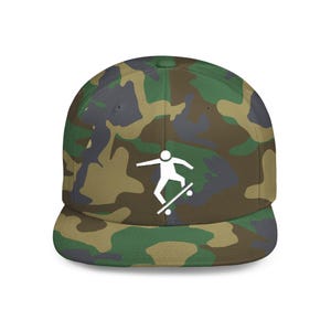 May include: A camouflage baseball cap with a white silhouette of a person skateboarding on the front.