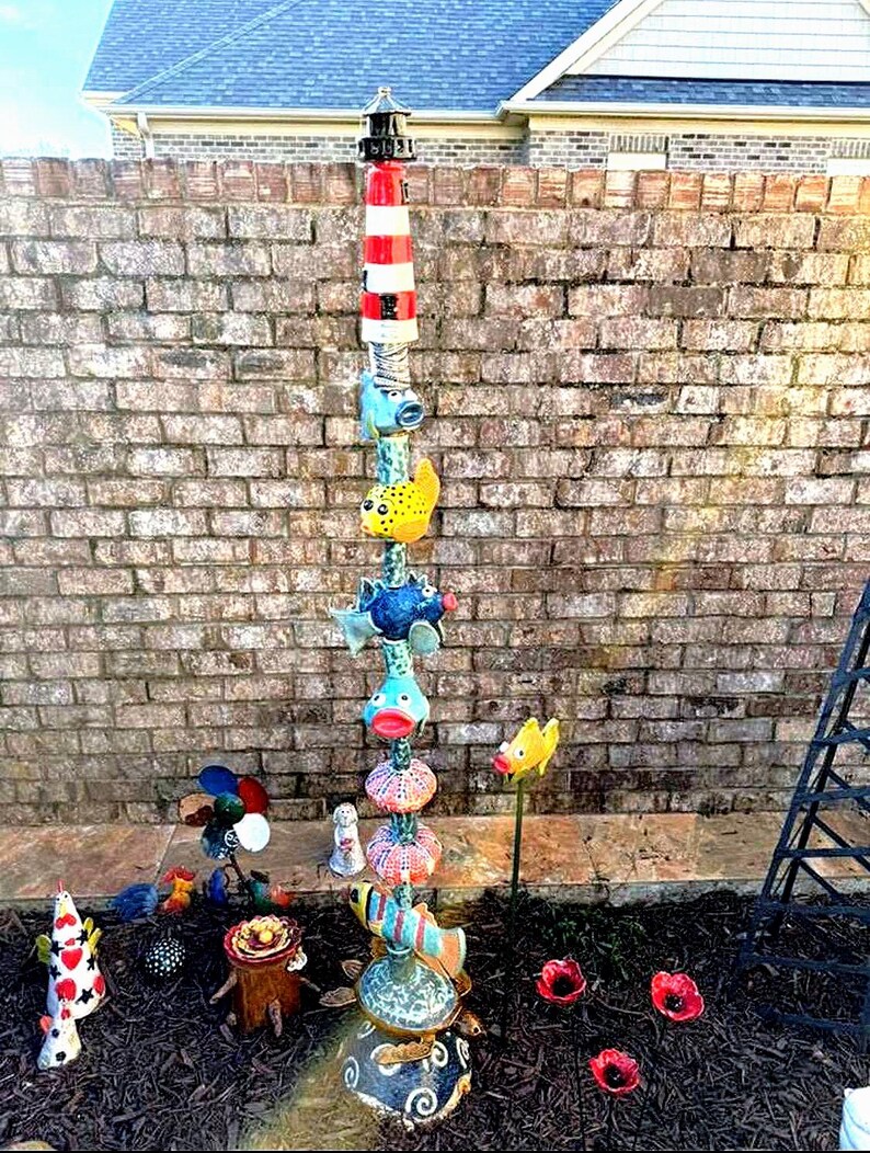 The lighthouse made by Connie Fish from the USA she used my design template the  lighthouse make this, to top off the magnificent tote pole. what would you do with your lighthouse? fabulous! thanks for sharing your pictures with us Connie.