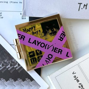 Layover (V/Taehyung) - Hinged Solo Era Albums & CD Spinning Pins