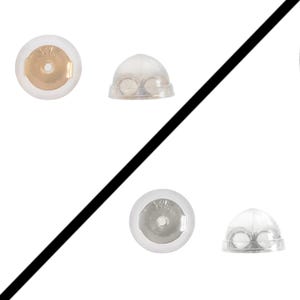 May include: Four earring backs, two are clear plastic and two are metal. The metal backs are marked with "14K".