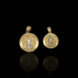 May include: Two gold pendants with a Saint Lazarus design. The larger pendant has the words "Saint Lazarus Pray For Us" around the edge. The smaller pendant has the words "Saint Lazarus" around the edge.