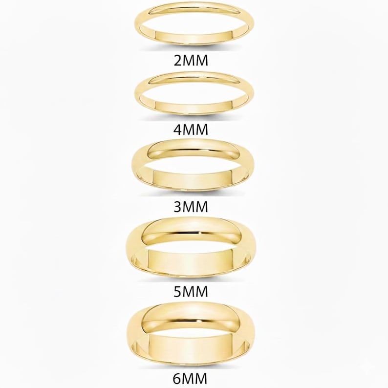 May include: A collection of gold-colored rings in various widths, including 2mm, 3mm, 4mm, 5mm, and 6mm. The rings are displayed vertically, showcasing their different profiles and sizes. The background is a solid white.