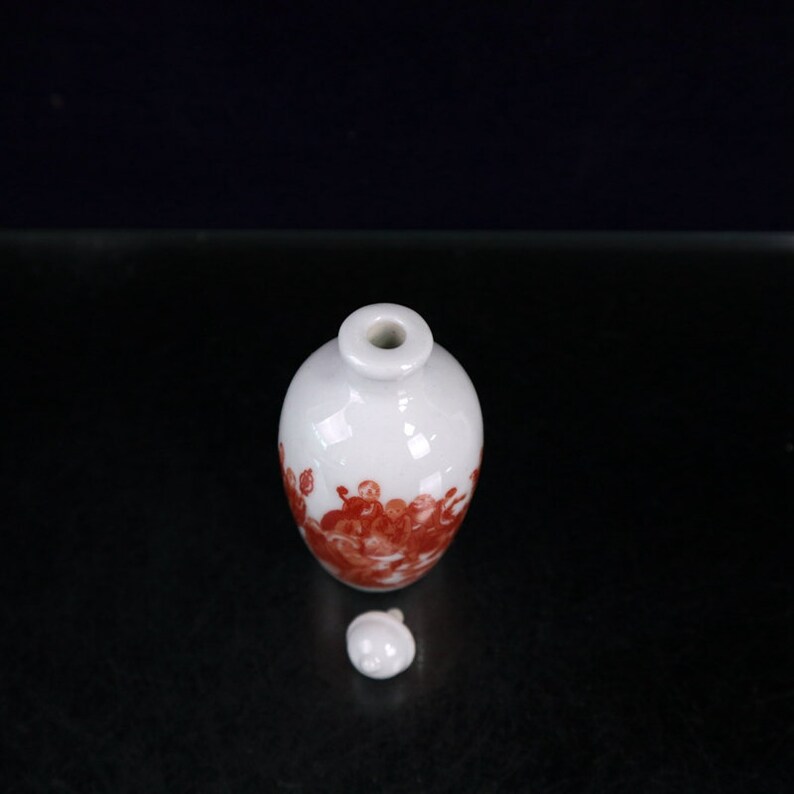 Jingdezhen Ceramic snuff bottle is an antique of China It is hand-painted with arhat pattern