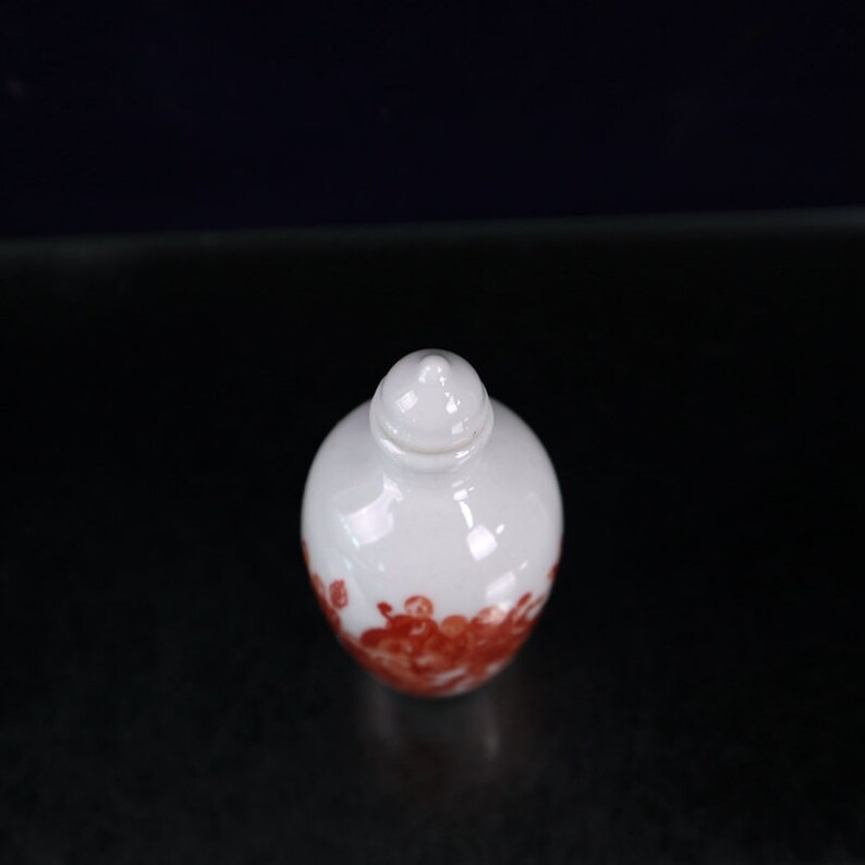 Jingdezhen Ceramic snuff bottle is an antique of China It is hand-painted with arhat pattern