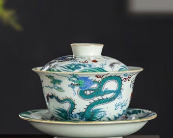 China Jingdezhen hand-carved enamel color Sancai Gaiwan Longteng Bubble Tea Bowl, worth collecting