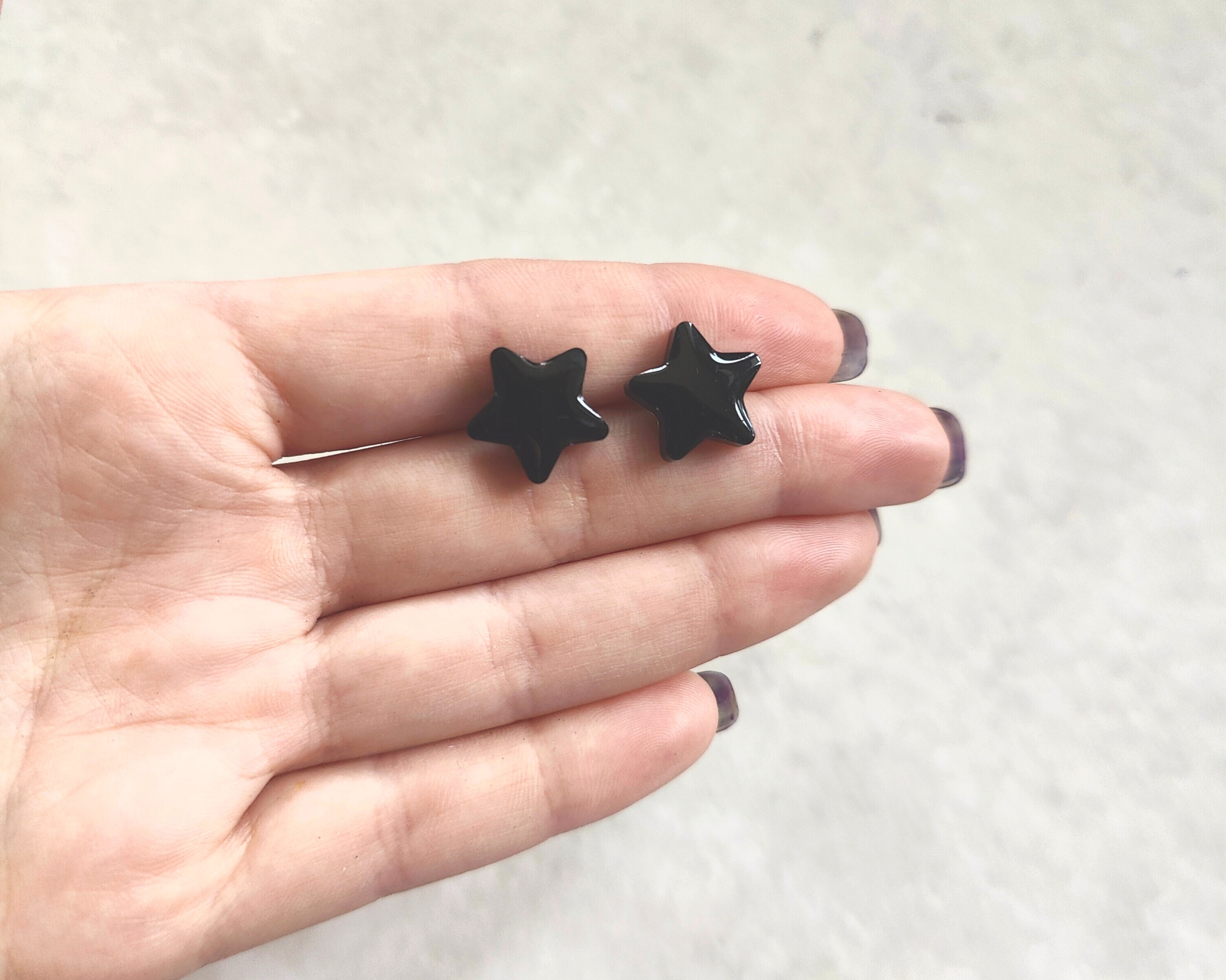 Black star stud online earrings
