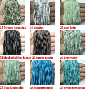 May include: A collection of 10 strands of gemstone beads, each strand is a different color and type of stone. The beads are small and round, and they are arranged in a grid pattern. The stones include African turquoise, howlite, new jade, black obsidian jasper, smoky quartz, amazonite, blue turquoise, and green turquoise.