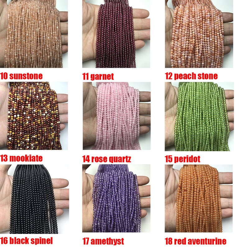 May include: Assortment of 18 strands of gemstone beads, each strand is a different color and type of gemstone. The beads are small and round. The strands are laid out in rows of three, with each row labeled with a number and the name of the gemstone. The gemstones include sunstone, garnet, peach stone, mookiate, rose quartz, peridot, black spinel, amethyst, and red aventurine.