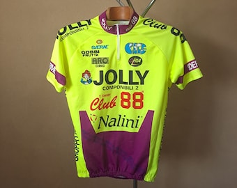 May include: A yellow and purple cycling jersey with the text "Jolly Componibili 2 Club 88 Nalini" and various sponsor logos.