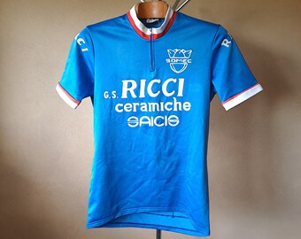 maillot cycliste italien vintage des années 80, simple mais audacieux et bleu à manches courtes avec logos Somec brodés, taille L pour homme/XXL pour femme