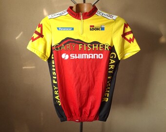 Maillot cycliste suisse orange vif a manches courtes vintage des annees 90 taille M Etsy France