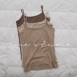 Camisola suave con correa de espagueti táctil