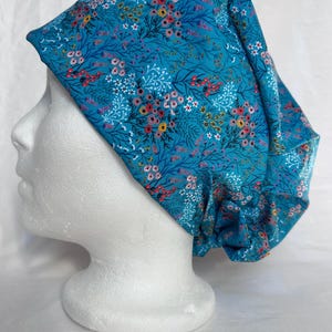 Blue & Tiny flower scrub cap for women. Surgical scrub hat for operating room. Nurse scrub cap. Surgeon scrub hat. The Scrub Locker Canada.