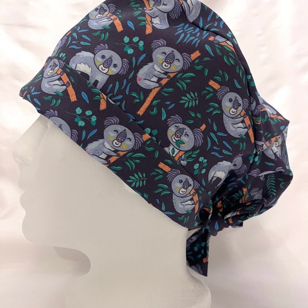 Koala bear on blue surgical scrub hat for women. Operating room apparel. Made in Ontario, Canada. The Scrub Locker