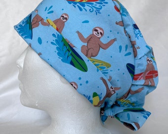 Surfing Summer Sloths Scrub Hat. Pleated Pixie Style for Women. Made in Canada By The Scrub Locker Shop.