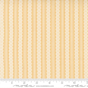 May include: A yellow fabric with a white stripe pattern. The stripes are made up of small white flowers. The fabric is 44 inches wide.