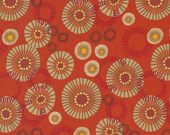 May include: A seamless pattern featuring a repeating design of red, orange, and brown circles with a sunburst effect on a red background.