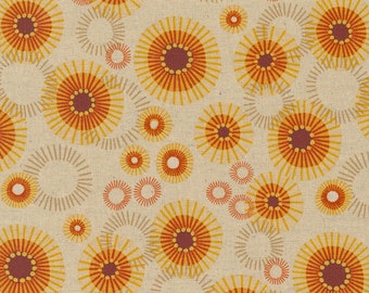 May include: A seamless pattern featuring a repeating design of stylized orange and yellow sunbursts on a beige background.