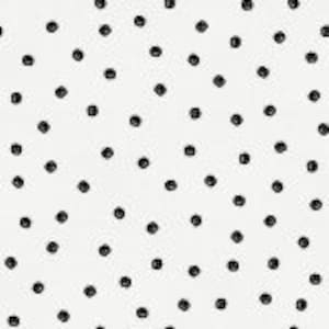 May include: A white background with a repeating pattern of small black circles.