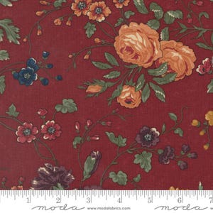 May include: A close-up of a floral fabric with a deep red background. The fabric features a pattern of orange and peach roses, blue and burgundy flowers, and green leaves. The word "moda" is printed at the bottom.