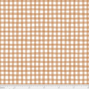 May include: A white fabric with a brown gingham pattern. The fabric has a subtle watercolor effect. The fabric is measured in inches.