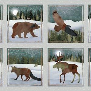 May include: A collection of eight framed watercolor illustrations featuring North American wildlife in a snowy forest setting. Animals include a deer, bear, eagle, elk, wolf, fox, moose, and bison. Each scene has a full moon and falling snow.