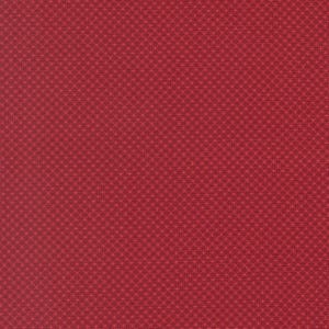 May include: A solid red fabric with a repeating pattern of small, dark red crosses. The pattern covers the entire surface, creating a textured appearance. The fabric is a deep, rich shade of red.
