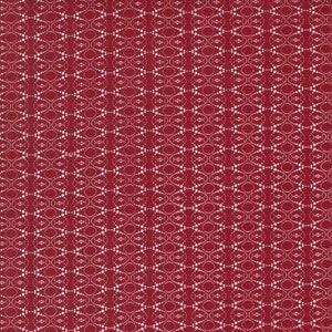 May include: A red fabric with a white geometric pattern. The pattern is made up of small circles and ovals.
