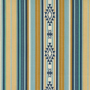 May include: Textile with a Southwestern design. The fabric features vertical stripes in shades of blue, gold, and cream. A central cream-colored band displays geometric diamond patterns in navy blue, creating a bold, eye-catching pattern. The overall design is reminiscent of Native American art.