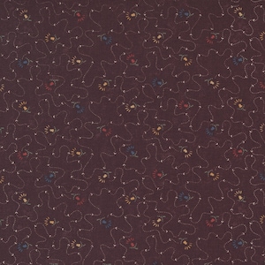 May include: A dark brown fabric with a repeating pattern of small, colorful flowers and curved lines. The flowers are in shades of red, yellow, blue, and green.