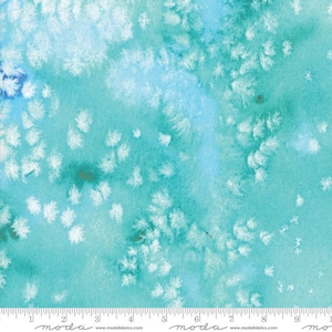 May include: Abstract watercolor fabric with a teal blue background and white splatter paint. The fabric has a subtle ombre effect with a lighter blue at the top and a darker blue at the bottom.