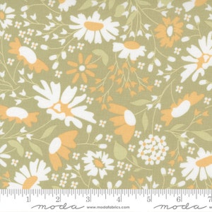 May include: A green fabric with a white and orange floral pattern. The fabric features a repeating pattern of daisies and smaller flowers.