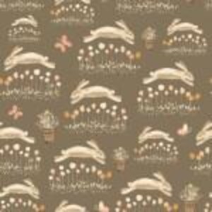 May include: A repeating pattern featuring cream-colored rabbits leaping across a brown background. The design includes small floral elements and butterflies in shades of pink and cream, creating a whimsical, nature-inspired aesthetic.