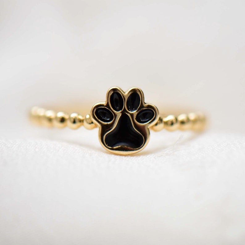 Gold store paw ring