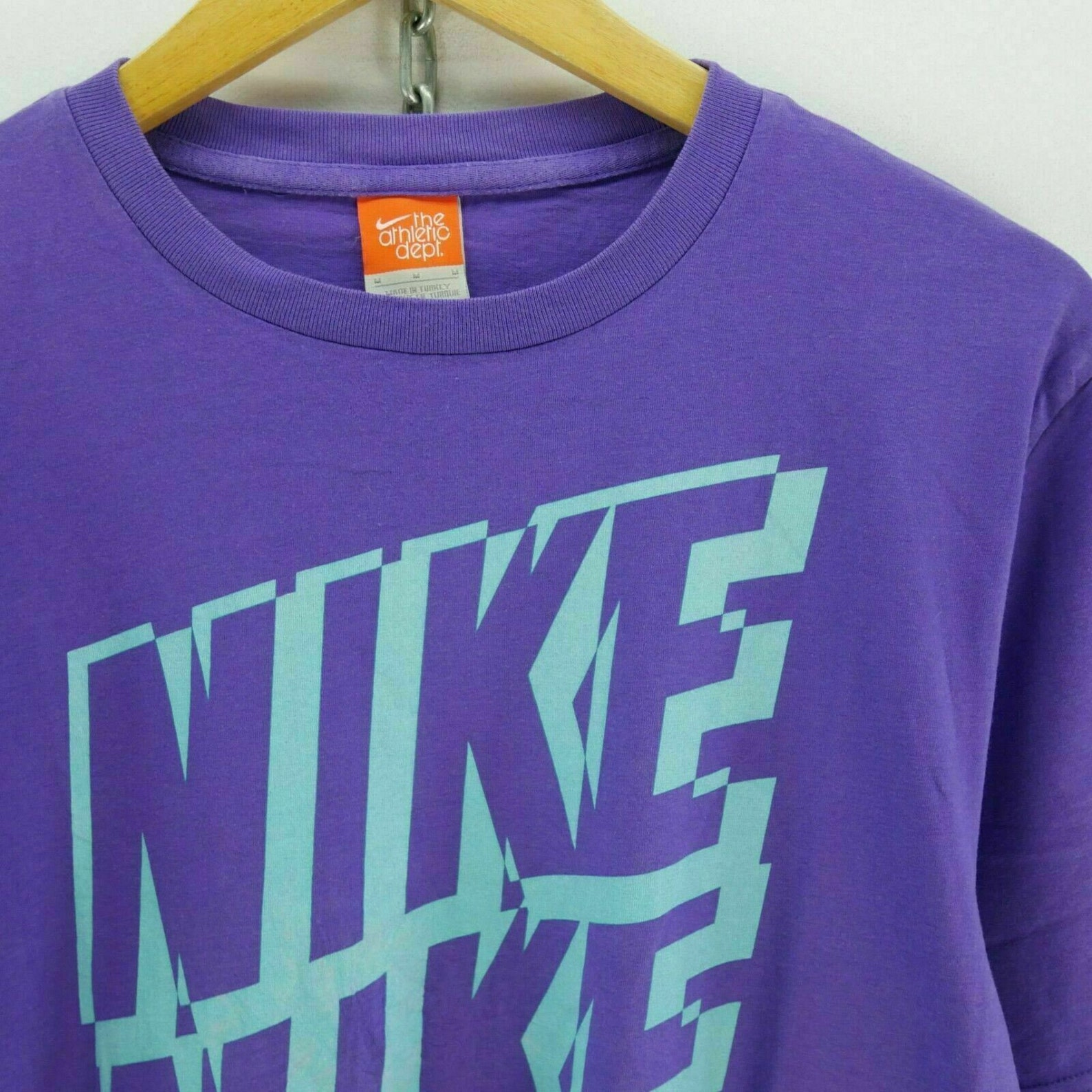 regency purple nike shirt
