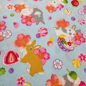 Japanese Bunny & Sakura Fabric – Light Blue Cotton, Made in Japan, Rabbits with Strawberries and Cherry Blossoms for Quilting and Crafts