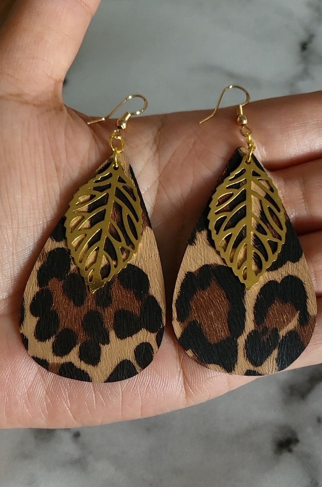 Mini borsa con manici in pelle leopardata di colore Nero & Camel | Dr