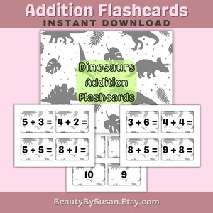 May include: Printable dinosaur themed addition flashcards for kids. The flashcards feature simple addition problems with sums up to 10. The text on the flashcards reads "Dinosaurs Addition Flashcards".