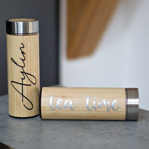 Personalized thermos drinking bottle in bamboo look glued on vacuum bottle